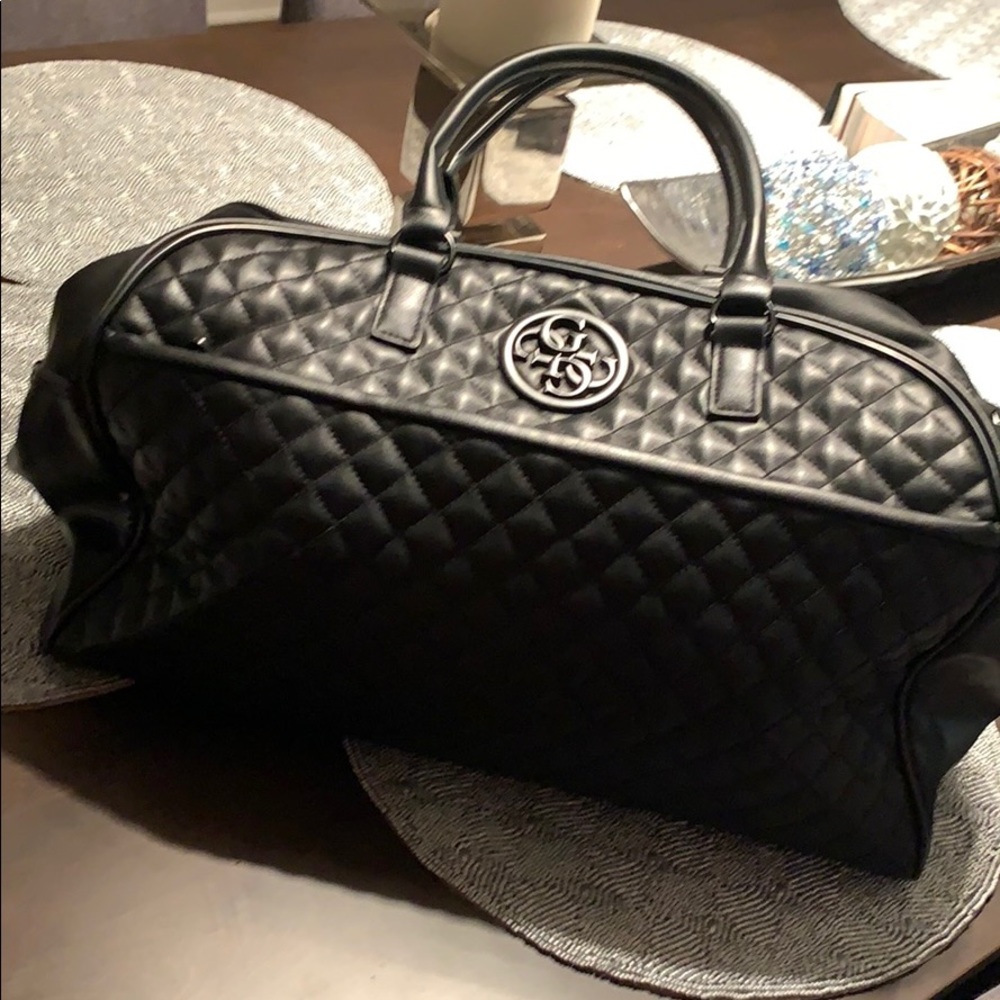 Duffel bag with adjustable strap